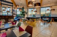 Reštaurácia alebo iné gastronomické zariadenie v ubytovaní Holiday Inn Bologna - Fiera by IHG