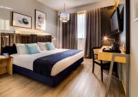 Posteľ alebo postele v izbe v ubytovaní Holiday Inn Bologna - Fiera by IHG