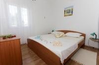 Postel nebo postele na pokoji v ubytování Holiday Home Irena