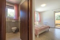Posteľ alebo postele v izbe v ubytovaní Complex of 2 villas Banjole-Marisol with 2 private pools for up to 20 persons only 200m from the beach - WiiBuk