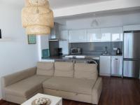 Kuchyň nebo kuchyňský kout v ubytování Life Apartments Fuentebravía