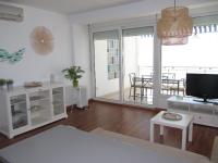 TV a/nebo společenská místnost v ubytování Life Apartments Fuentebravía