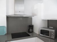Kuchyň nebo kuchyňský kout v ubytování Life Apartments Fuentebravía