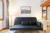 A seating area at Modern Studio Flat - 3 mins from Duomo Square
