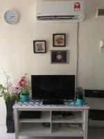 A1-04-03 Damiana Apartmentにあるテレビまたはエンターテインメントセンター
