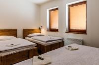 Postel nebo postele na pokoji v ubytování Horský apartmán Václavov