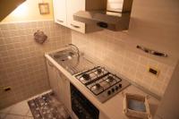 A kitchen or kitchenette at LA CASA TRA GLI ULIVI