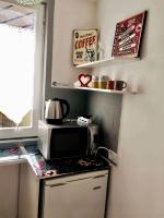 A kitchen or kitchenette at Sweet Home Panisperna