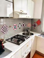 A kitchen or kitchenette at Sweet Home Panisperna