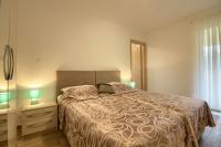 Posteľ alebo postele v izbe v ubytovaní Luxury Villa Olivia with pool , 200m from the beach