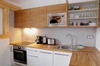 Kuchyň nebo kuchyňský kout v ubytování Apartmany Slunecnice