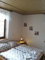 Postel nebo postele na pokoji v ubytování Apartmá Doubek