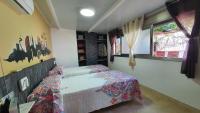 A bed or beds in a room at Atico Terraza, Airport-BCN, Puerto-Cruceros
