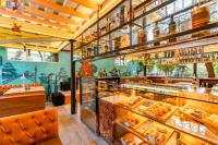 a restaurant with a lot of food on display at Flock Kathmandu in Kathmandu