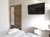 Postel nebo postele na pokoji v ubytování Rooms Ambrožič