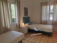 Postel nebo postele na pokoji v ubytování Villa Bahía