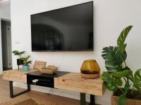 TV a/nebo společenská místnost v ubytování Villa Bahía
