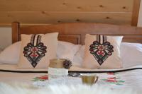 Posteľ alebo postele v izbe v ubytovaní Apartamenty u Bacy