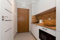 Kuchyňa alebo kuchynka v ubytovaní Warsaw To Be - Silver Apartment