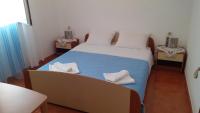 Posteľ alebo postele v izbe v ubytovaní Apartments Slavica