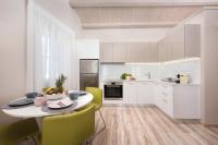 Kuchyňa alebo kuchynka v ubytovaní Volto Kokkini Apartment