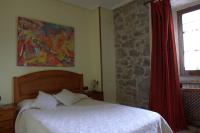 Postel nebo postele na pokoji v ubytování Hostal Rural Elosta