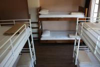 Postel nebo postele na pokoji v ubytování Pella Inn Hostel