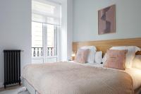 Posteľ alebo postele v izbe v ubytovaní Mayor Suite 3 by FeelFree Rentals