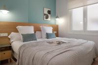 Posteľ alebo postele v izbe v ubytovaní Mayor Suite 3 by FeelFree Rentals