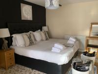 Postel nebo postele na pokoji v ubytování New Inn - Dorchester