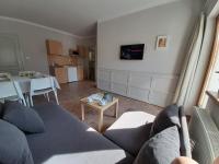 Kuchyňa alebo kuchynka v ubytovaní Família Apartmanház