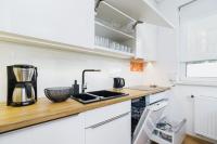 Kuchyňa alebo kuchynka v ubytovaní Apartments Supernova near Tauron Arena by Noclegi Renters