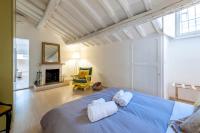 Łóżko lub łóżka w pokoju w obiekcie IREX Trevi Fountain private Penthouse