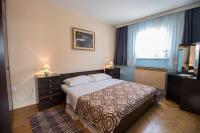 Posteľ alebo postele v izbe v ubytovaní Apartment Kralj