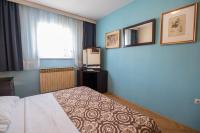 Posteľ alebo postele v izbe v ubytovaní Apartment Kralj