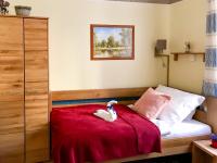 Łóżko lub łóżka w pokoju w obiekcie Golden Wood Apartments
