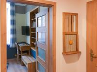 Telewizja i/lub zestaw kina domowego w obiekcie Golden Wood Apartments