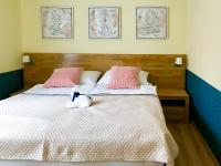 Łóżko lub łóżka w pokoju w obiekcie Golden Wood Apartments