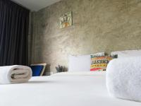 Postel nebo postele na pokoji v ubytování Laemsai Resort