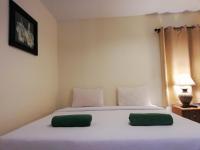 Postel nebo postele na pokoji v ubytování Laemsai Resort