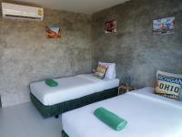 Postel nebo postele na pokoji v ubytování Laemsai Resort