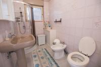 Kúpeľňa v ubytovaní Apartment Kralj