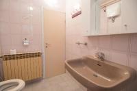 Kúpeľňa v ubytovaní Apartment Kralj