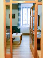 Łóżko lub łóżka w pokoju w obiekcie Golden Wood Apartments