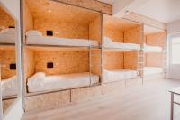 Postel nebo postele na pokoji v ubytování SubUp Hostel
