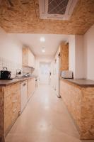 Kuchyň nebo kuchyňský kout v ubytování SubUp Hostel