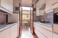 Kuchyňa alebo kuchynka v ubytovaní Rome as you feel - Luxury Cappellari Apartment