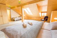 Postel nebo postele na pokoji v ubytování Vinný apartmán Rakovník