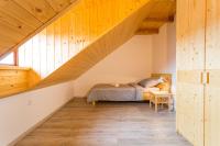 Postel nebo postele na pokoji v ubytování Vinný apartmán Rakovník