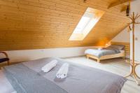 Postel nebo postele na pokoji v ubytování Vinný apartmán Rakovník
